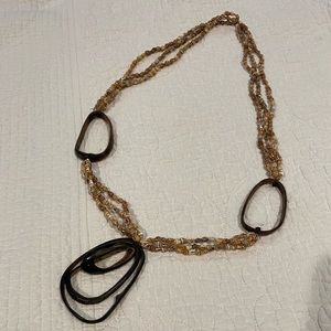 Unique shell and deer antler necklace.